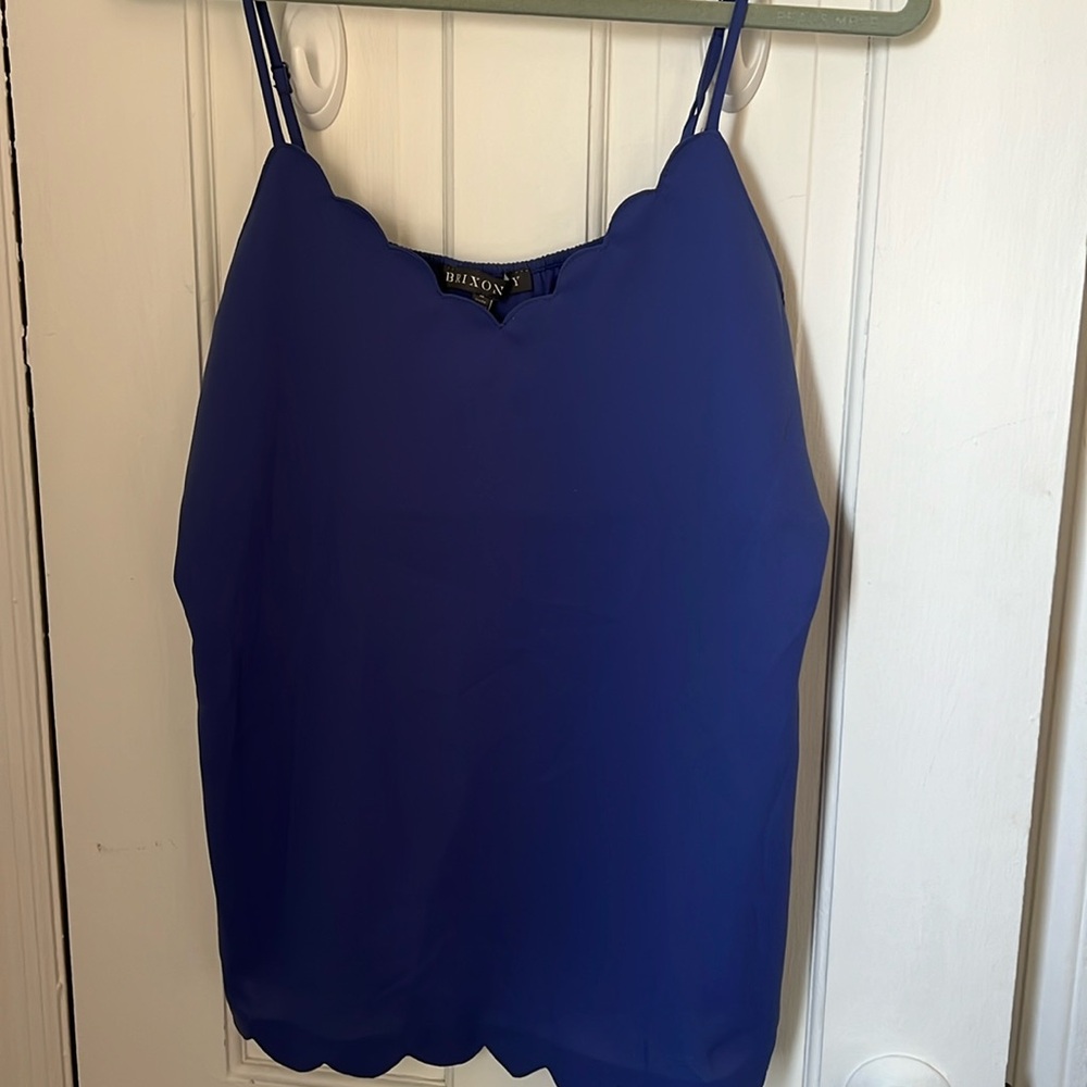 Blue cami top with petal hemming